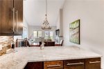 Fully equipped kitchen featuring granite counter tops